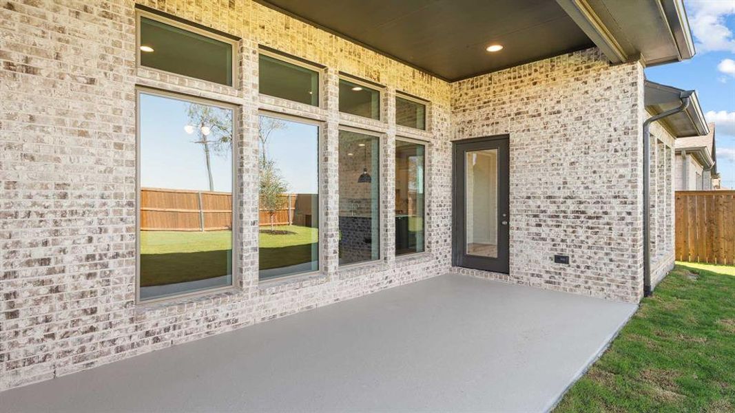 Exterior details and patio area of a home in North Sky 65', Celina (Image 3). Exterior details and patio area of a home in North Sky 65', Celina (Image 3).