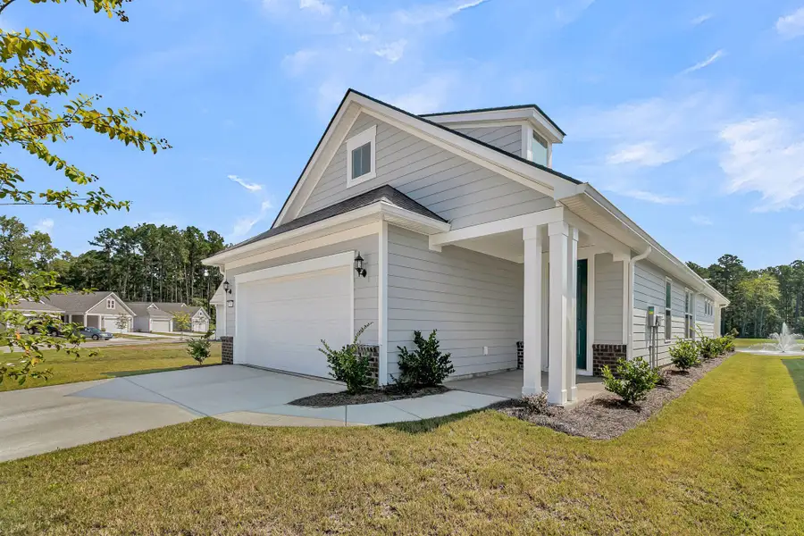Front exterior of a new home in , Summerville, SC, highlighting curb appeal (Image 24).