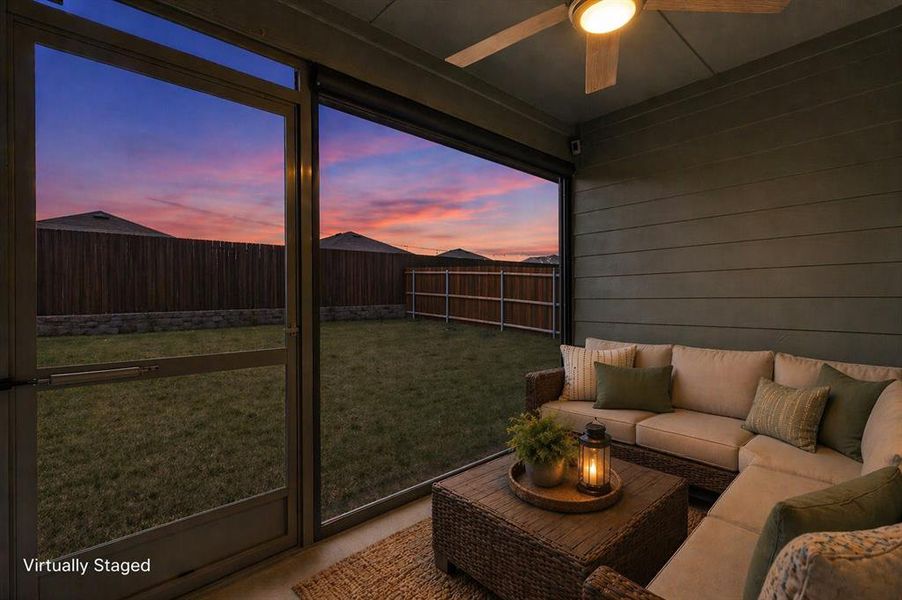 Screened patio featuring a ceiling fan, horizontal siding, and concrete flooring Screened patio featuring a ceiling fan, horizontal siding, and concrete flooring