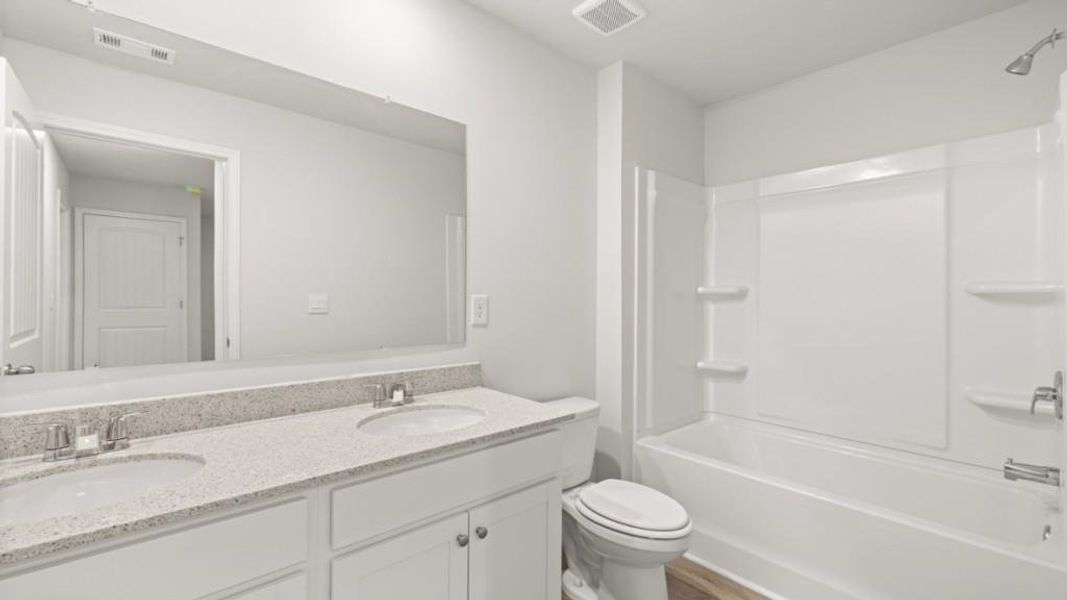Furnished interior view inside a new home in Falcon Landing, Gainesville (Image 8).