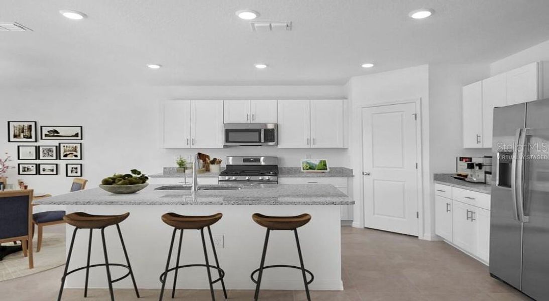 Furnished interior view inside a new home in Waterstone, Groveland (Image 11). Furnished interior view inside a new home in Waterstone, Groveland (Image 11).