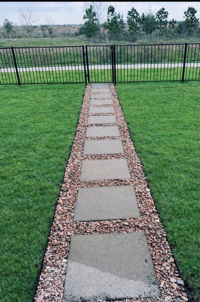 walk from your patio to walking path and backyard creek views.