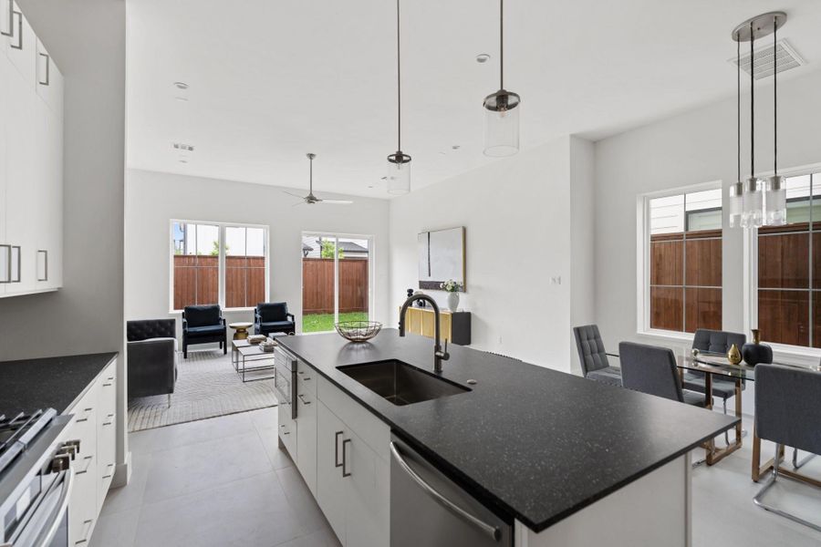 Fully equipped with a 36’’ Stainless Steel Gas Range by Frigidaire, Faber 28’’ Range Hood, 36’’ Stainless Steel French door refrigerator/freezer, Microwave drawer in island, and 24’’ Frigidaire dishwasher Fully equipped with a 36’’ Stainless Steel Gas Range by Frigidaire, Faber 28’’ Range Hood, 36’’ Stainless Steel French door refrigerator/freezer, Microwave drawer in island, and 24’’ Frigidaire dishwasher