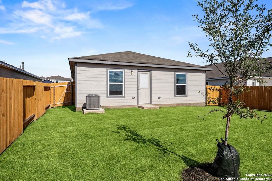 Front exterior of a new home in Savannah Place, San Antonio, TX, highlighting curb appeal (Image 2).