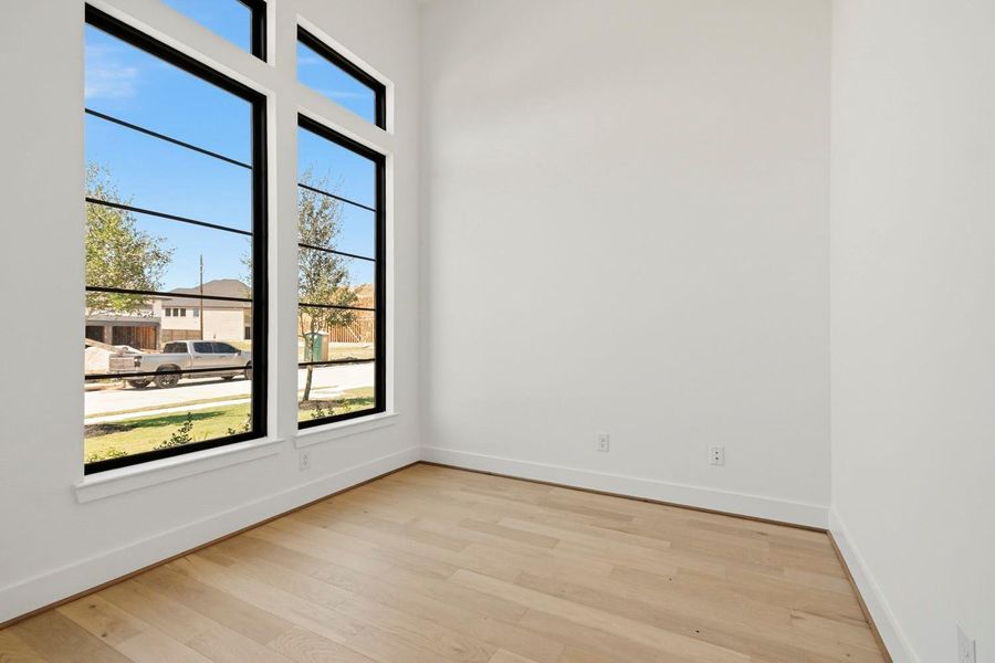 Spacious, unfurnished interior of a new home in Dunham Pointe 70', Cypress (Image 11).