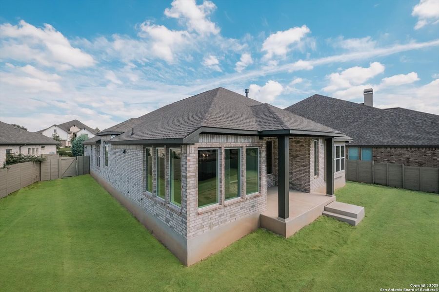 Exterior details and patio area of a home in The Grove at Vintage Oaks, New Braunfels (Image 19). Exterior details and patio area of a home in The Grove at Vintage Oaks, New Braunfels (Image 19).