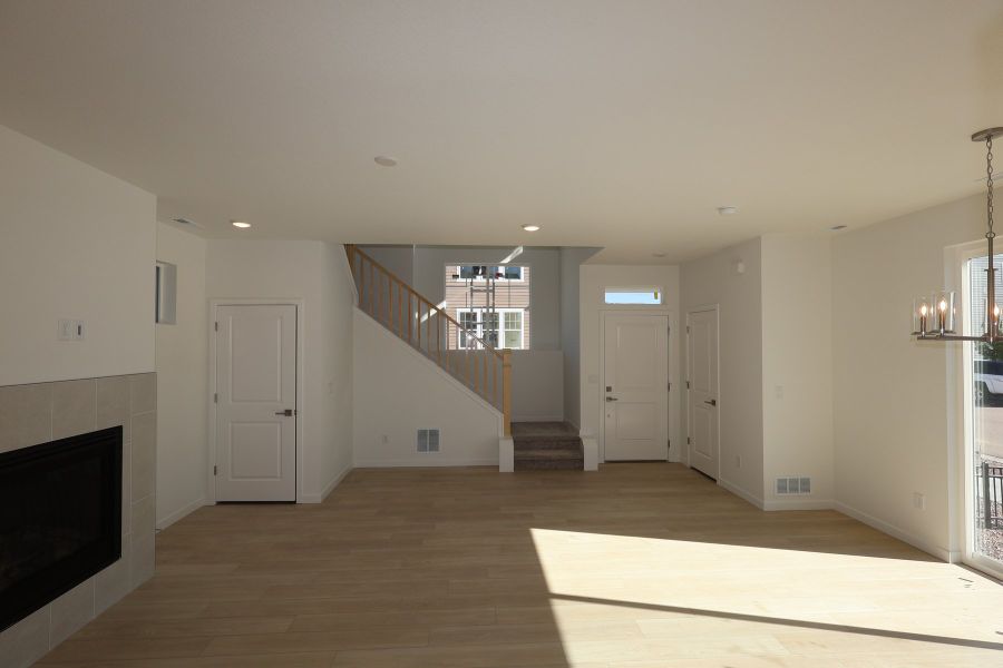 Spacious, unfurnished interior of a new home in Revel Crossing at Wolf Ranch – The Ascent Collection, Colorado Springs (Image 7).