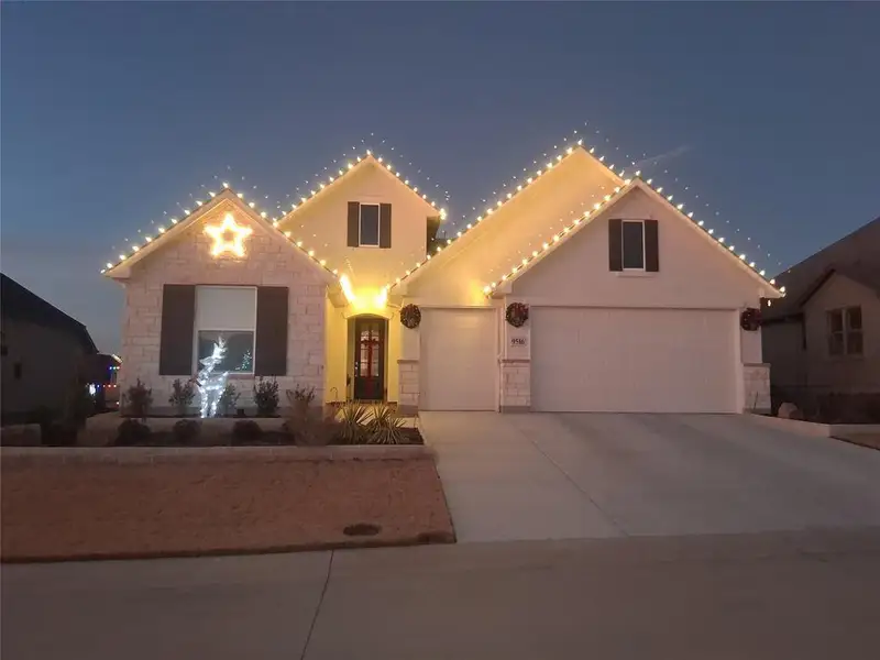 Front exterior of a new home in , Denton, TX, highlighting curb appeal (Image 21). Front exterior of a new home in , Denton, TX, highlighting curb appeal (Image 21).