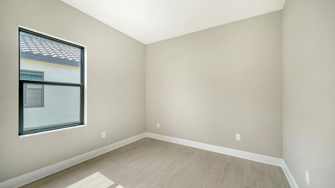 Spacious, unfurnished interior of a new home in Vicenza Real Estate and Homes for Sale in North Venice, FL - Neal Communities, Venice (Image 35).