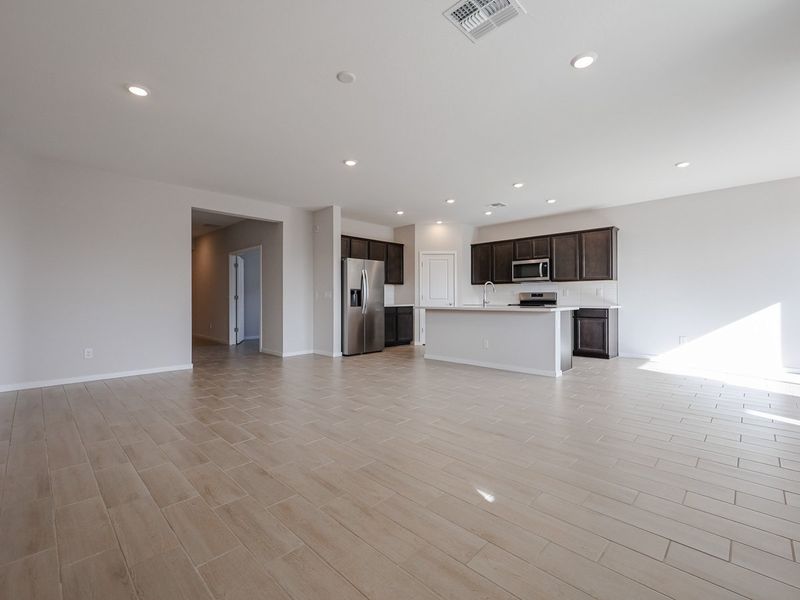 A large empty kitchen. A large empty kitchen.