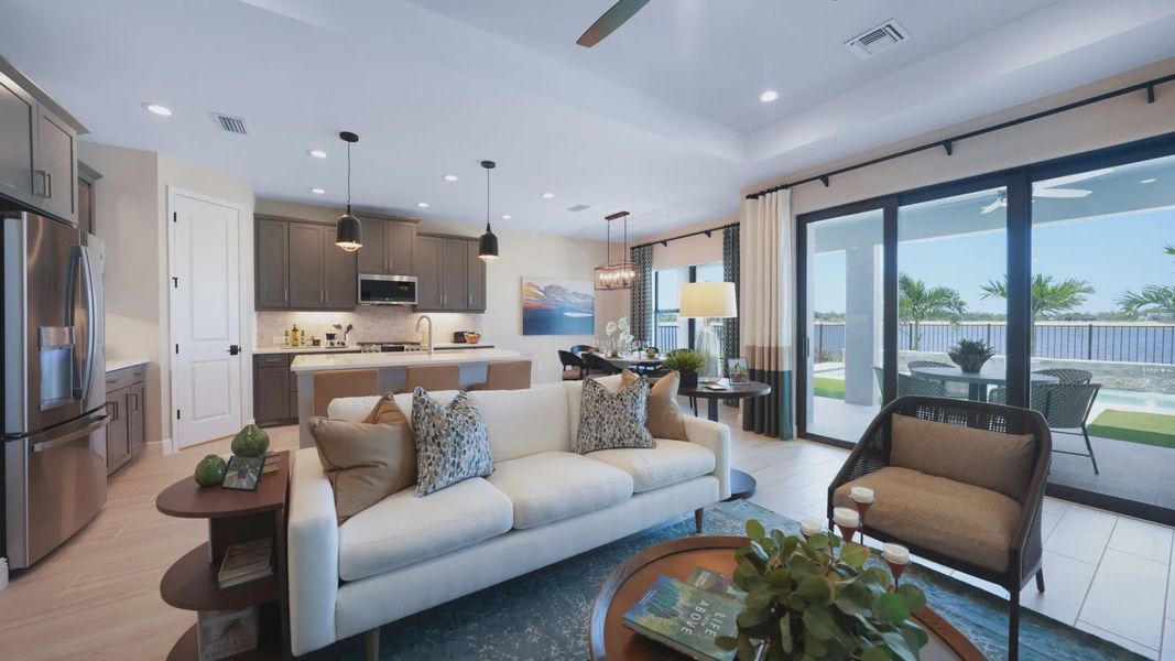 Representative furnished interior of a home built from the Meadow Brook by Neal Communities in SkySail, Naples (Image 17).
