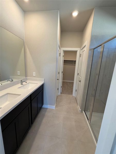 Primary Bath with dual vanities & walk-in shower