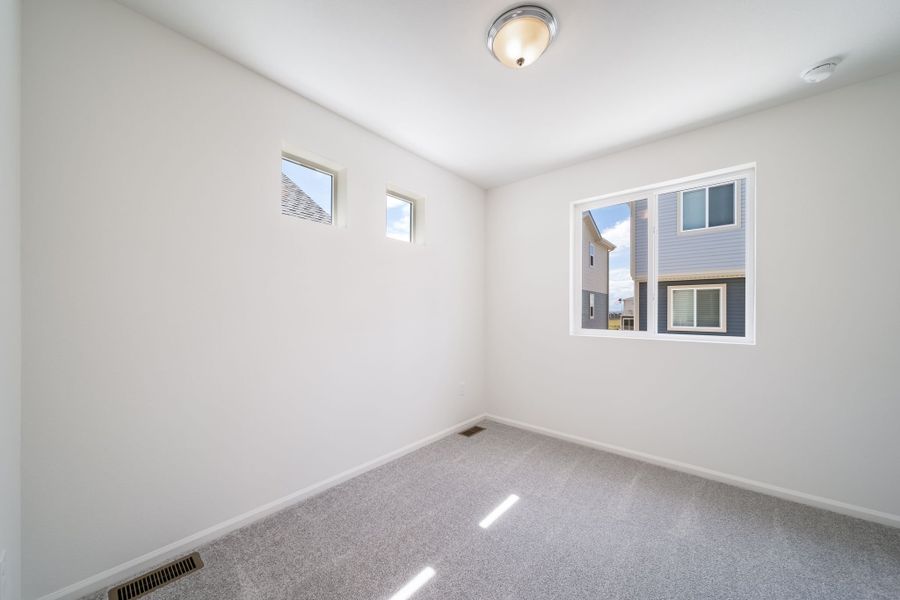 Spacious, unfurnished interior of a new home in Reunion, Commerce City (Image 6). Spacious, unfurnished interior of a new home in Reunion, Commerce City (Image 6).