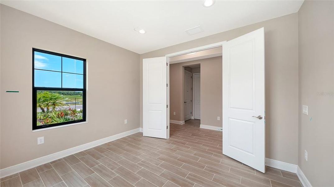 Spacious, unfurnished interior of a new home in Grand Park, Sarasota (Image 38). Spacious, unfurnished interior of a new home in Grand Park, Sarasota (Image 38).