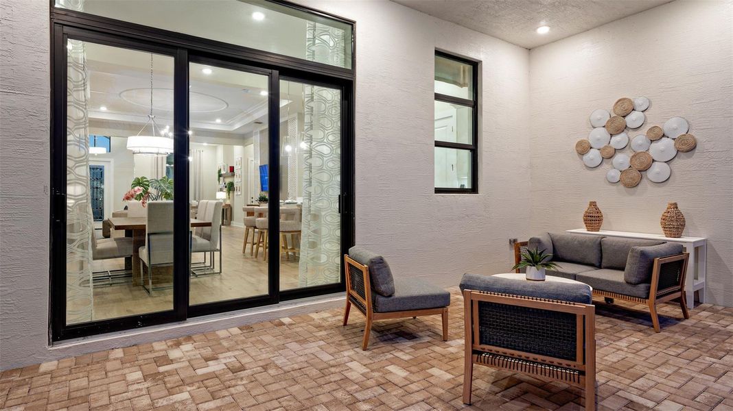 Exterior details and patio area of a home in Cresswind Palm Beach at Westlake, Westlake (Image 4).