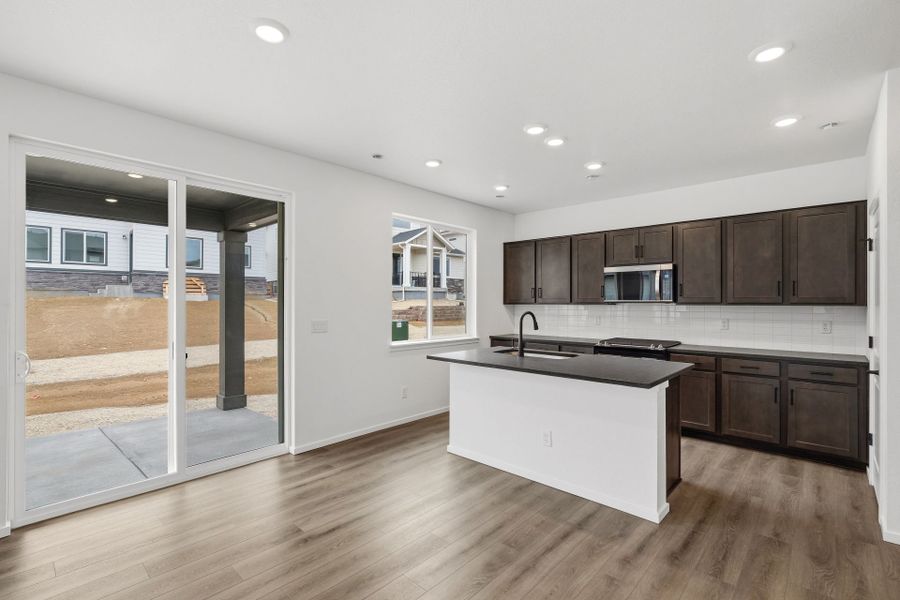 Furnished interior view inside a new home in Harvest Crossing, Aurora (Image 7).