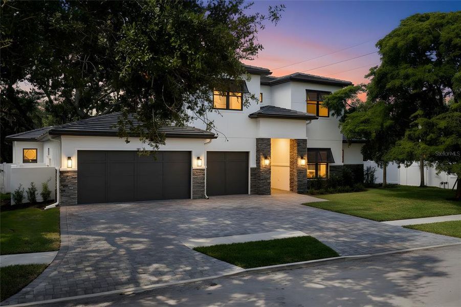 Front exterior of a new home in , Sarasota, FL, highlighting curb appeal (Image 25).