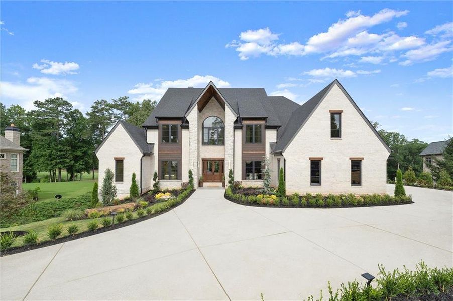 Front exterior of a new home in , Alpharetta, GA, highlighting curb appeal (Image 26).