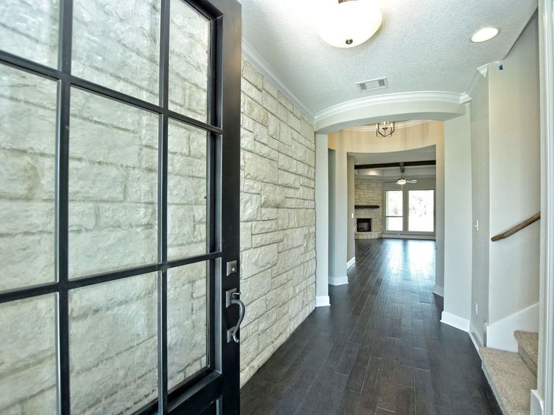 Representative unfurnished interior of a home built from the Madera II by Giddens Homes in Scofield Farms Estates, Georgetown (Image 325).