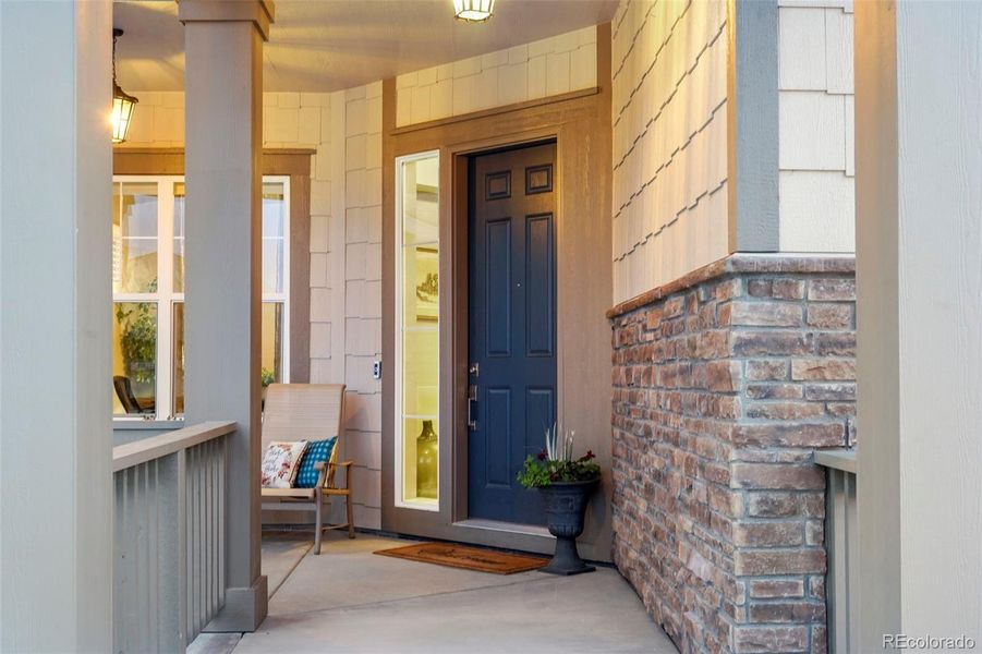 Check out this large, covered front porch that is the perfect place to sit and meet your new neighbors