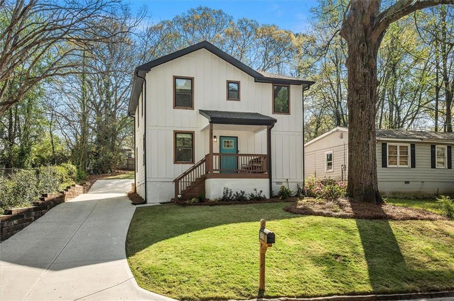 Front exterior of a new home in , Scottdale, GA, highlighting curb appeal (Image 25).