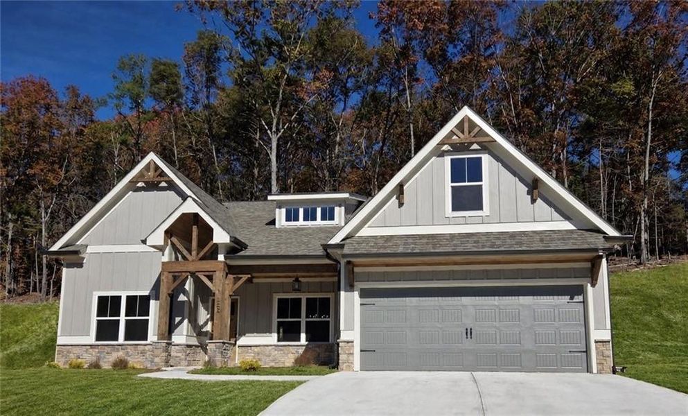 Front exterior of a new home in , Waleska, GA, highlighting curb appeal (Image 1). Front exterior of a new home in , Waleska, GA, highlighting curb appeal (Image 1).