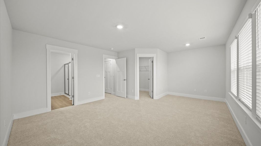 Desirable primary suite layout with spacious en suite bath in a proven, established community