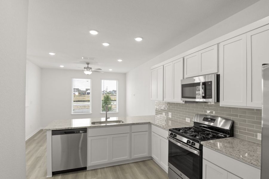 Furnished interior view inside a new home in Trace, San Marcos (Image 19).