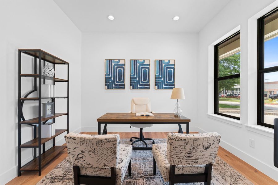 Flooded with natural light, the downstairs office pairs street views with tucked-away tranquility for work, creativity, and everything in between. Flooded with natural light, the downstairs office pairs street views with tucked-away tranquility for work, creativity, and everything in between.