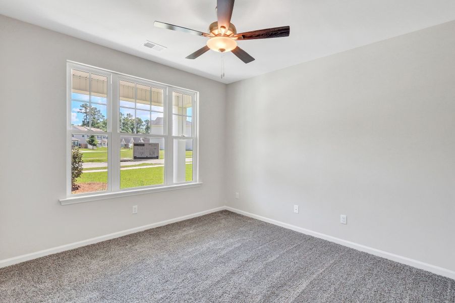 Representative unfurnished interior of a home built from the The Dublin by Smith Family Homes in Settlers Hammock, Kingsland (Image 27).