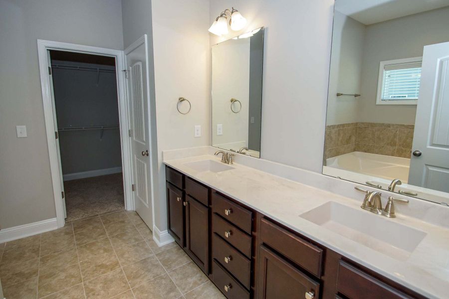 Representative furnished interior of a home built from the Clayton by Caviness & Cates Communities in Bartlett Manor, Youngsville (Image 192).
