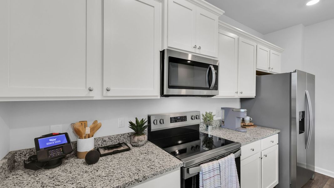 Representative furnished interior of a home built from the BELHAVEN by D.R. Horton in The Ranch, Holly Hill (Image 10). Representative furnished interior of a home built from the BELHAVEN by D.R. Horton in The Ranch, Holly Hill (Image 10).