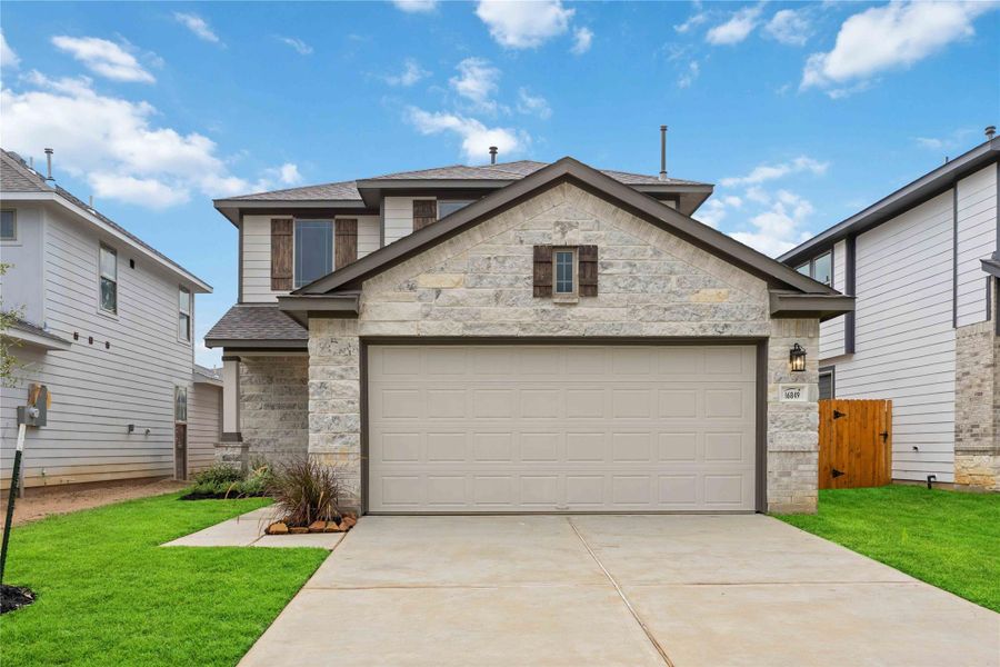 Front exterior of a new home in Granger Pines, Conroe, TX, highlighting curb appeal (Image 1). Front exterior of a new home in Granger Pines, Conroe, TX, highlighting curb appeal (Image 1).