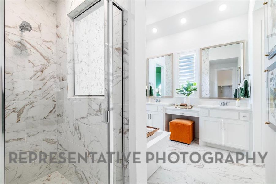 Bathroom with vanity, a marble finish shower, recessed lighting, light marble finish floors, and a tub Bathroom with vanity, a marble finish shower, recessed lighting, light marble finish floors, and a tub