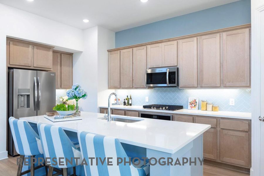 Furnished interior view inside a new home in 6 Creeks at Waterridge, Kyle (Image 5).