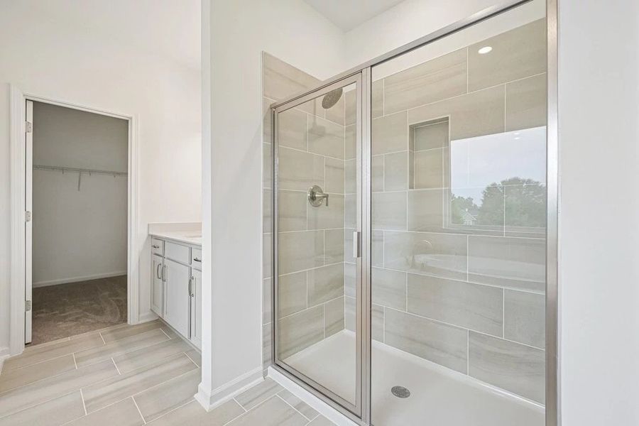 Primary Bath featuring the AW Collection® Milan - Clean geometry and high-contrast finishes. Primary Bath featuring the AW Collection® Milan - Clean geometry and high-contrast finishes.