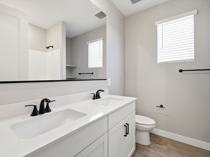 Furnished interior view inside a new home in White Tank Foothills Reserve Series, Waddell (Image 8). Furnished interior view inside a new home in White Tank Foothills Reserve Series, Waddell (Image 8).