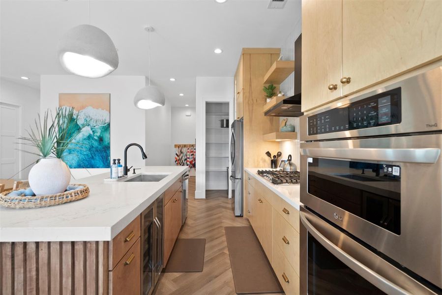 Sleek simplicity meets natural warmth in this Japandi-inspired kitchen. Light wood cabinetry, clean lines, and a soft neutral palette create a serene, functional space. The minimalist island invites gathering without clutter, blending Japanese calm with Scandinavian practicality. Sleek simplicity meets natural warmth in this Japandi-inspired kitchen. Light wood cabinetry, clean lines, and a soft neutral palette create a serene, functional space. The minimalist island invites gathering without clutter, blending Japanese calm with Scandinavian practicality.