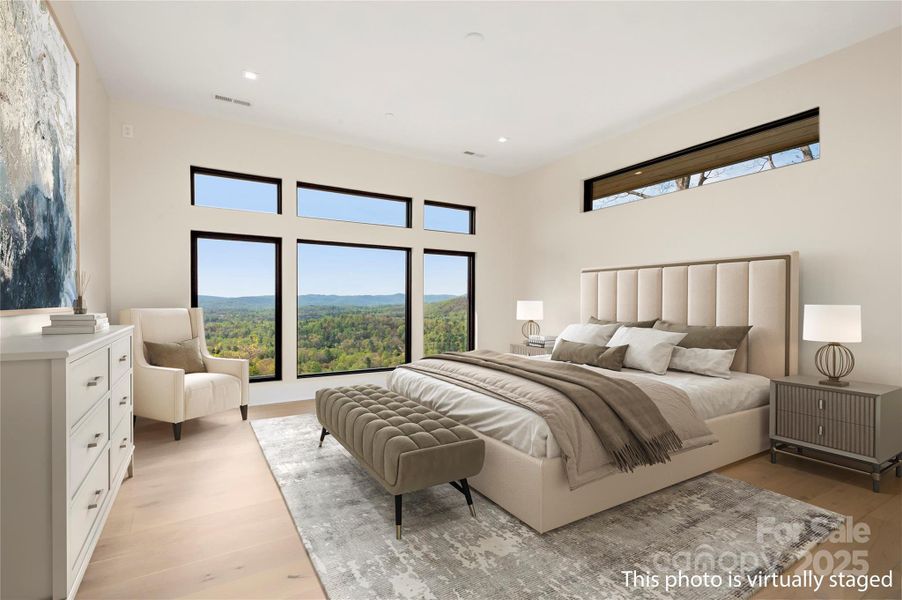 Wake up to gorgeous mountain view’s in the spacious primary bedroom.