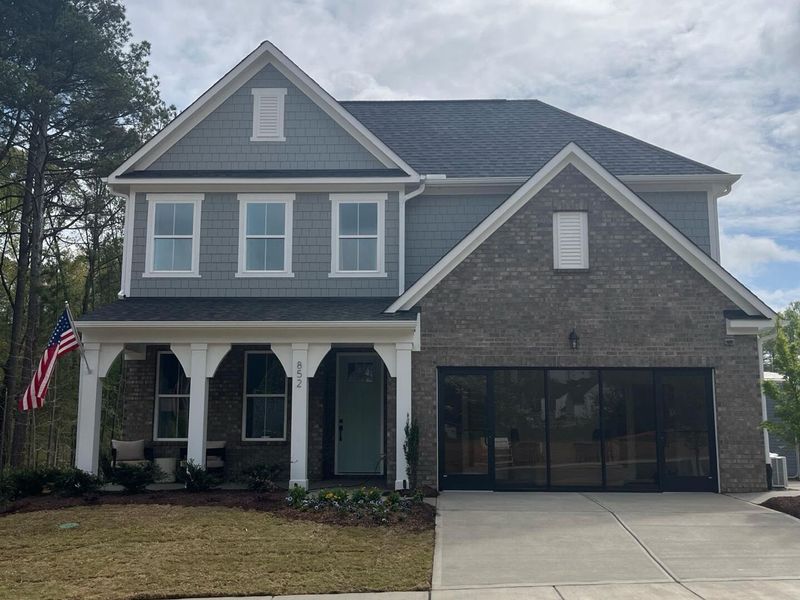 Front exterior of a new home in Sage on North Main, Wake Forest, NC, highlighting curb appeal (Image 25).