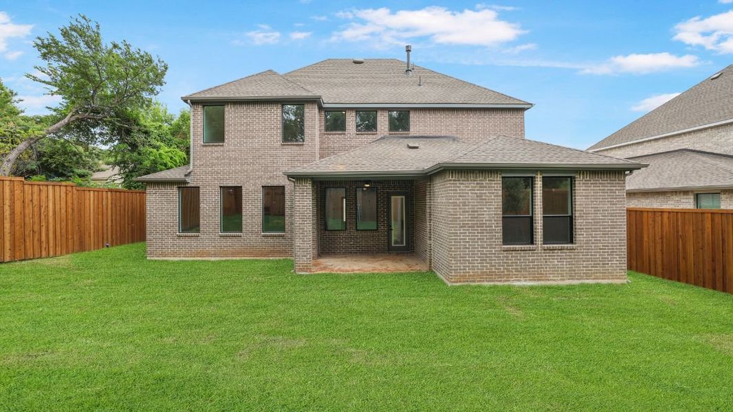 Representative exterior photo of a completed home built from the Hemingway by D.R. Horton in Northside Place, Carrollton, TX (Image 23). Representative exterior photo of a completed home built from the Hemingway by D.R. Horton in Northside Place, Carrollton, TX (Image 23).
