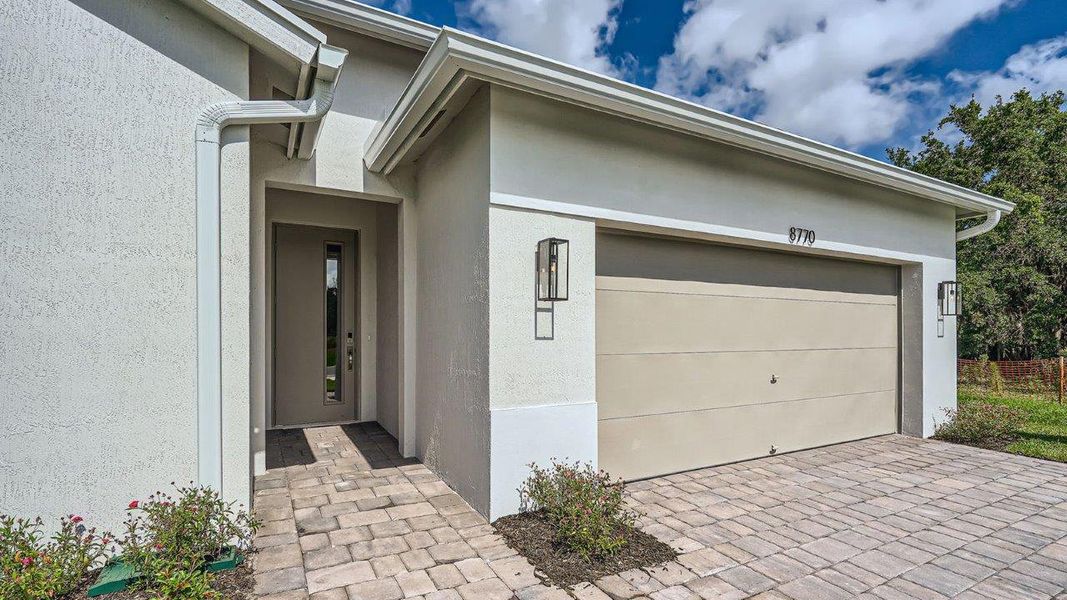 Representative exterior photo of a completed home built from the Delray by D.R. Horton in Twin Oaks, Stuart, FL (Image 15).