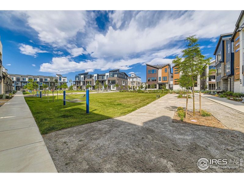 Front exterior of a new home in Baseline, Broomfield, CO, highlighting curb appeal (Image 24).