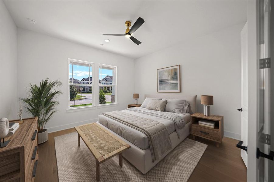 Bedroom with wood finished floors, ceiling fan, and recessed lighting