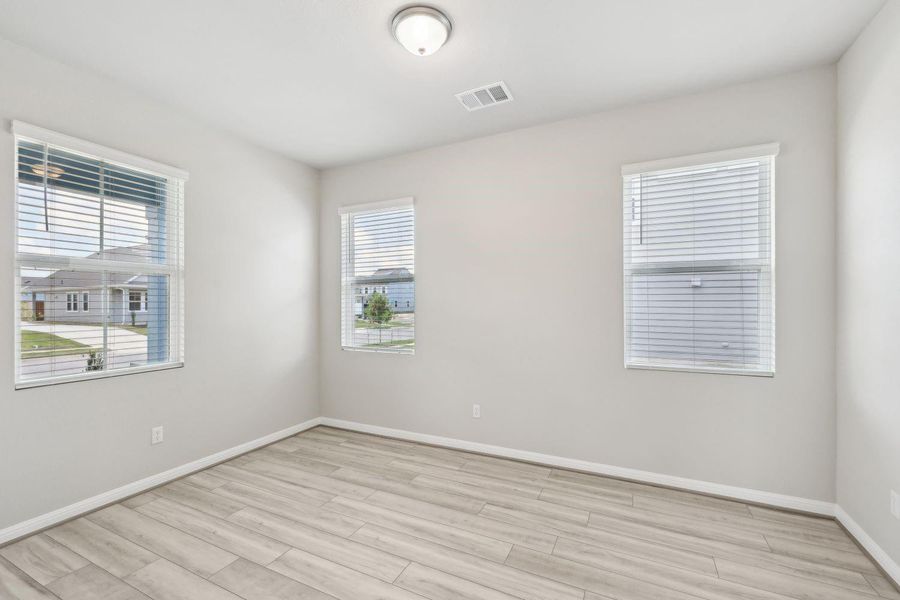 Den/office w/ vinyl plank flooring