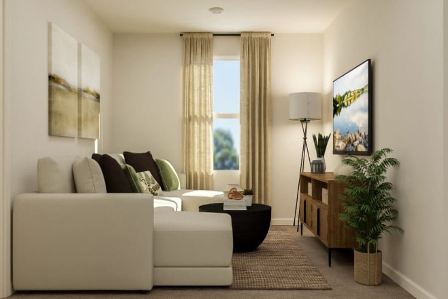 A living room with a white couch and a coffee table. A living room with a white couch and a coffee table.