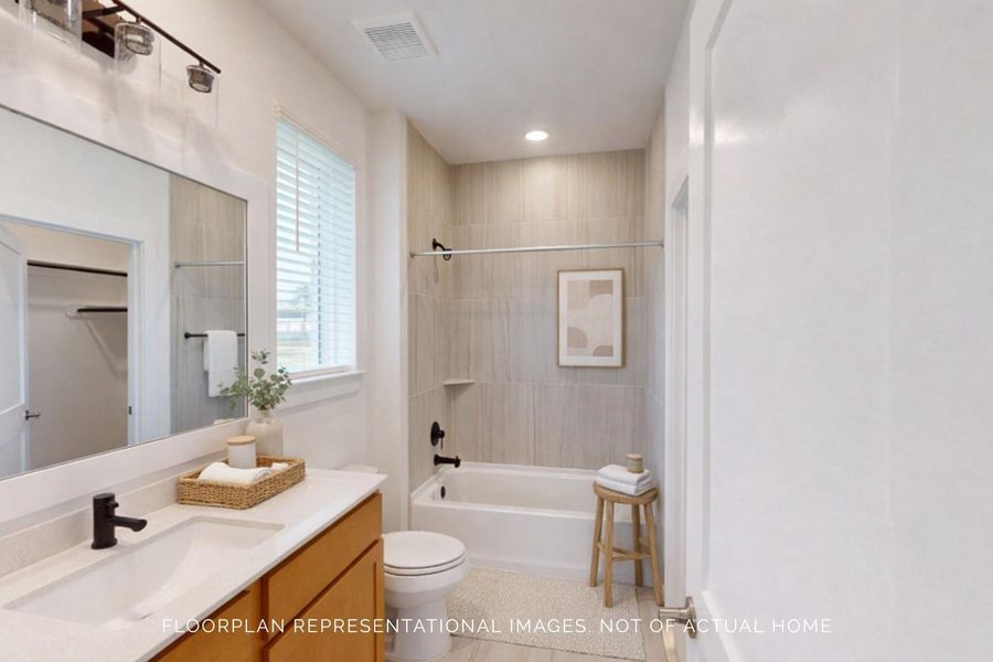 Furnished interior view inside a new home in Lone Star Landing, Montgomery (Image 7).