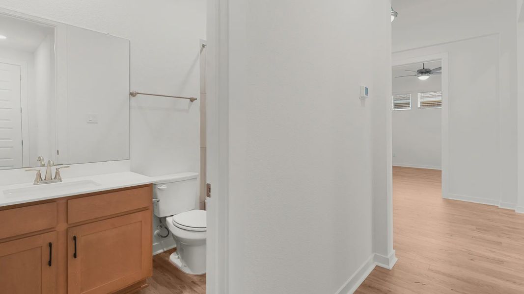 Representative furnished interior of a home built from the Bryson by Chesmar Homes in Newhaven, Manor (Image 9).