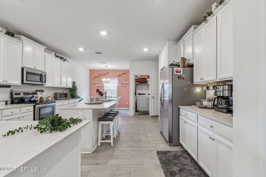 Furnished interior view inside a new home in Amelia Walk, Fernandina Beach (Image 6).