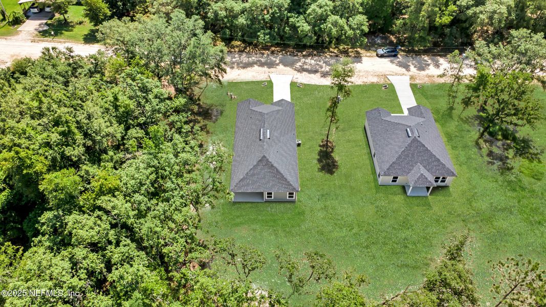 Front exterior of a new home in , Satsuma, FL, highlighting curb appeal (Image 23).